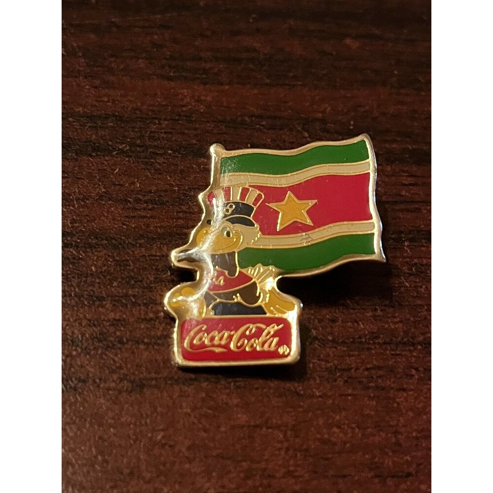 Vintage 1984 Los Angeles Olympics Coca Cola Sam Eagle Surinam‎ Flag Lapel Pin